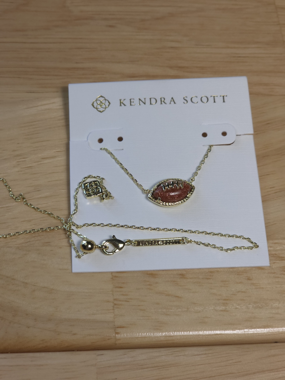 Kendra Scott Gold Necklace with Football Pendant